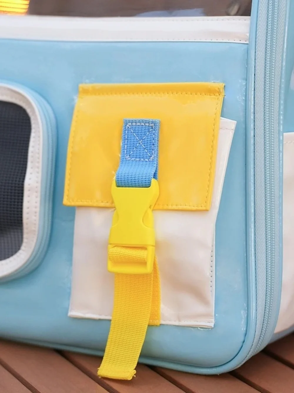 Light Blue Cat Carrier Backpack with Yellow Accents and Clear Window